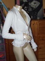 jolie veste blanche taille 38(petit 40) à 7 euros